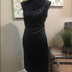 Black dress with gathered scooped neckline